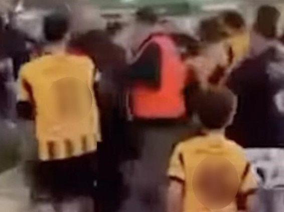 Blurred image of a soccer brawl in Peakhurst