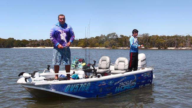 Doug Burt fishing with son Liam at the 2015 Gold Coast Flathead Classic. Pic: Nicholas McElroy.