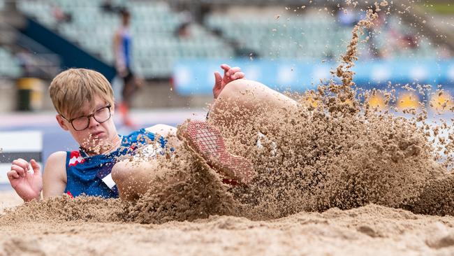 Action in the boys long jump 16 years final.