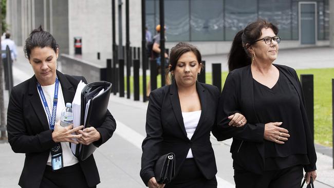 Slain teenager Tiffany Taylor’s mother Leanne Dillon (right) leaves the Brisbane Supreme Court. Picture: Attila Csaszar/AAP