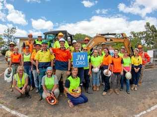 SPECIAL: A team of volunteers help build Monto a new Jehovah's Witness Kingdom Hall in 2019.