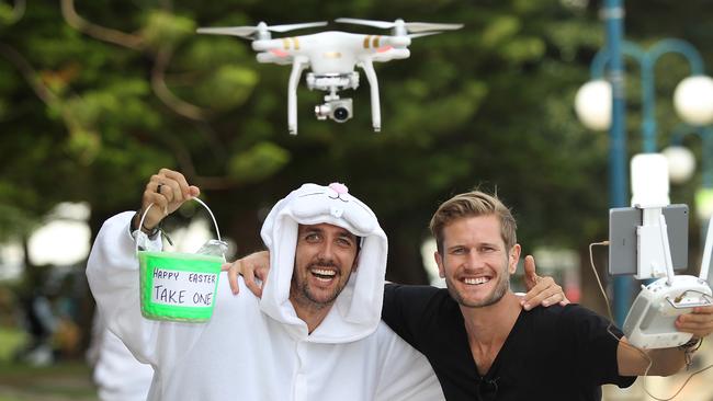 Adam Rikys and Hamish Cross who delivered easter eggs to strangers by drone on Saturday.