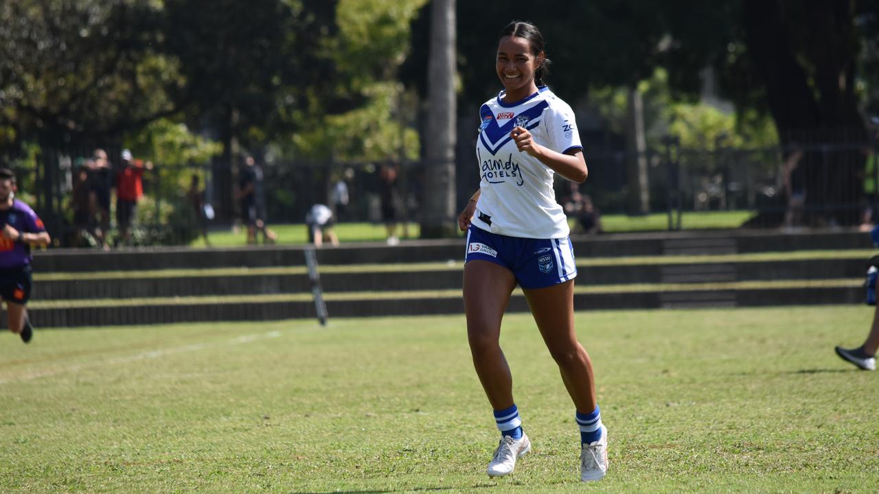 Ebony Raftstrand-Smith is all smiles playing rugby league. Watch for her defence as much as her running.