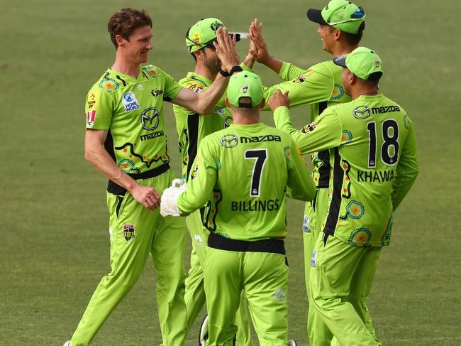 PERTH, AUSTRALIA - JANUARY 09: Brendan Doggett of the Thunder celebrates the wicket of Mitch MarshÃÂ of the Scorchers during the Big Bash League match between the Perth Scorchers and the Sydney Thunder at Optus Stadium, on January 09, 2021, in Perth, Australia. (Photo by Paul Kane/Getty Images)