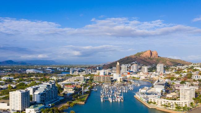 Aerial shot of Townsville with Castle Hill in the background