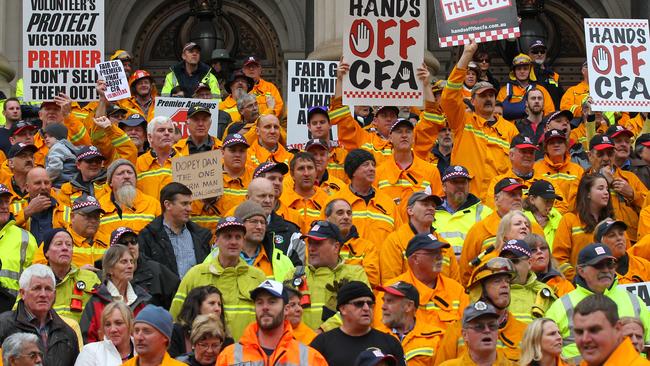 CFA members rally in front of Parliament on Sunday. Picture: David Crosling