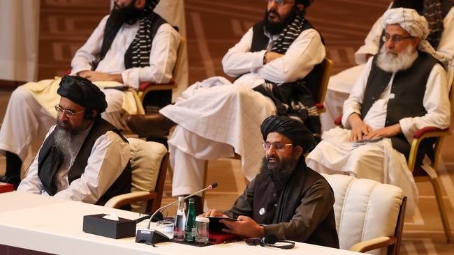 Mullah Abdul Ghani Baradar, bottom right, speaks during the opening session of the peace talks between the Afghan government and the Taliban in 2020. Picture: AFP