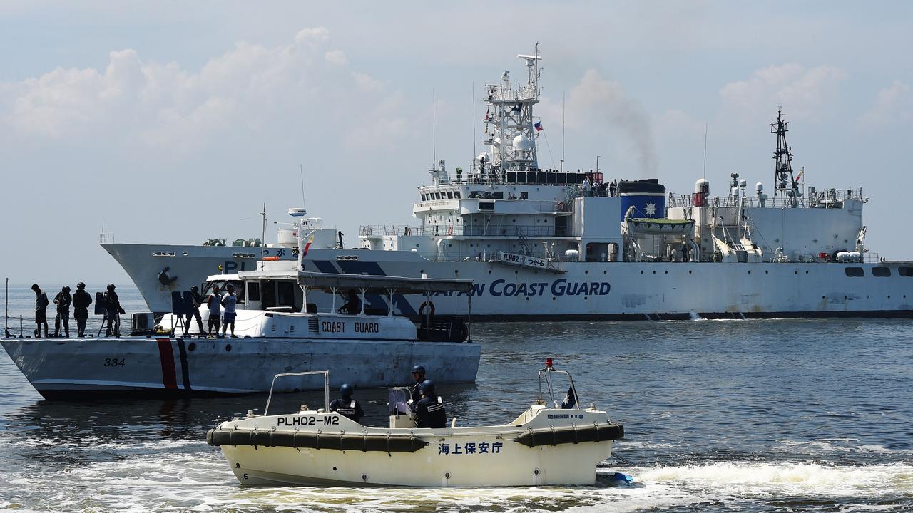 The Japanese Coast Guard ship with a Philippine Coast Guard boat during their annual joint anti-piracy exercise in the waters off Manila Bay, a day after a UN-backed tribunal declared China has no ‘historic rights’ in the South China Sea in 2016. Picture: Ted Aljibe/AFP