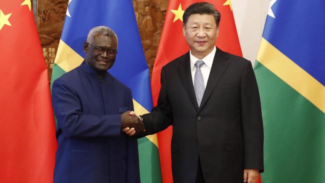 Chinese President Xi Jinping with Solomon Islands Prime Minister Manasseh Sogavare. Picture: Getty Images