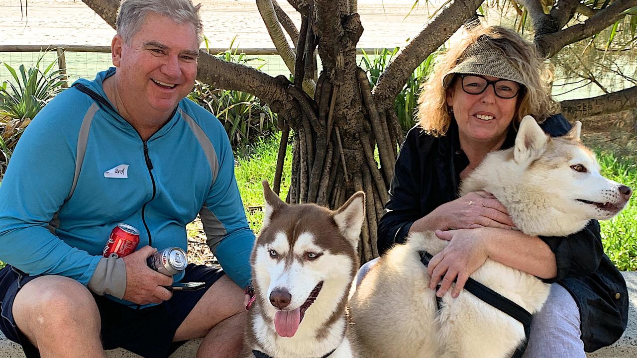 Gerard and Noelle Hall with their fur babies Lokki and Isla at Surfers Paradise. Picture Jenny Masters