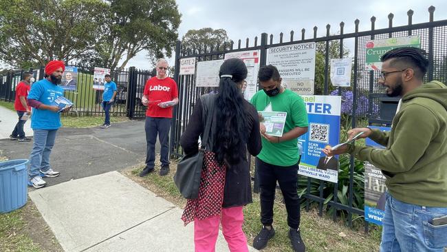 Voters enter Wentworthville Public School.