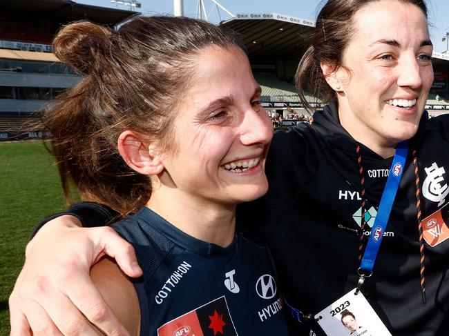 MELBOURNE, AUSTRALIA - SEPTEMBER 02: (L-R) Jessica Dal Pos, Kerryn Peterson and Darcy Vescio of the Blues celebrate during the 2023 AFLW Round 01 match between the Carlton Blues and the Gold Coast SUNS at IKON Park on September 02, 2023 in Melbourne, Australia. (Photo by Michael Willson/AFL Photos via Getty Images)