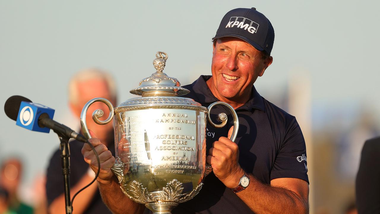 Phil Mickelson celebrates with the Wanamaker Trophy after winning the final round of the 2021 PGA Championship. Photo by Stacy Revere/Getty Images.