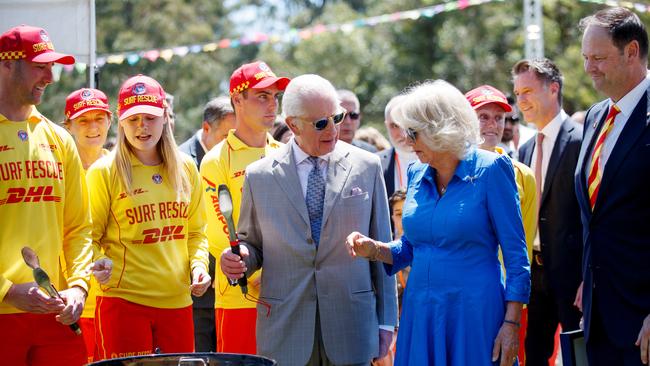 Charles, Camilla flip sausages at barbie