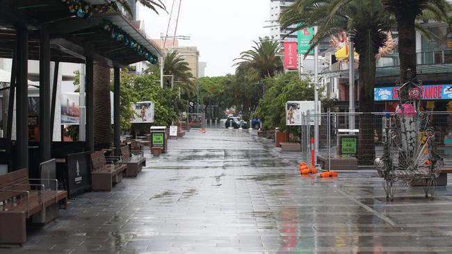 Surfers Paradise streets and beaches were deserted as a wet weather system hovered over the Gold Coast. Picture: Glenn Hampson