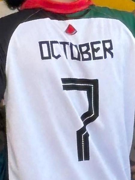 In an image shared with The Daily Telegraph, a man can be seen at Scenic World in the Blue Mountains wearing a Palestinian flag-coloured shirt with the words ‘October 7’.