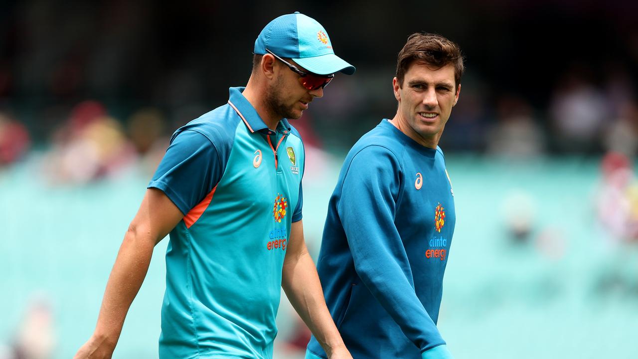 Josh Hazlewood and Pat Cummins of Australia are seen during day four. (Photo by Mark Kolbe/Getty Images)