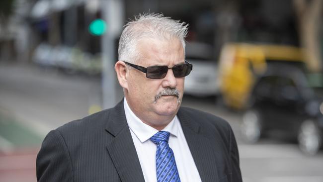 Ipswich City Council contractor Wayne Francis Innes arrives at the Brisbane District Court for sentencing today. Picture: AAP/Glenn Hunt