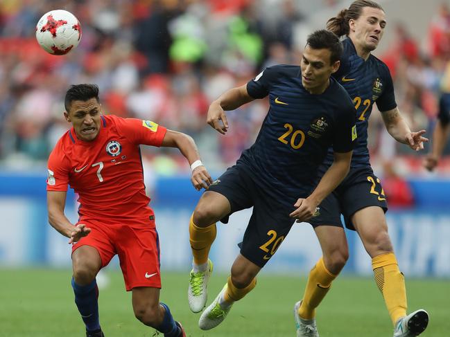 MOSCOW, RUSSIA - JUNE 25: Alexis Sanchez of Chile clashes with Trent Sainsbury (C) and Jackson Irvine of Australia during the FIFA Confederations Cup Russia 2017 Group B match between Chile and Australia at Spartak Stadium on June 25, 2017 in Moscow, Russia.  (Photo by Francois Nel/Getty Images)