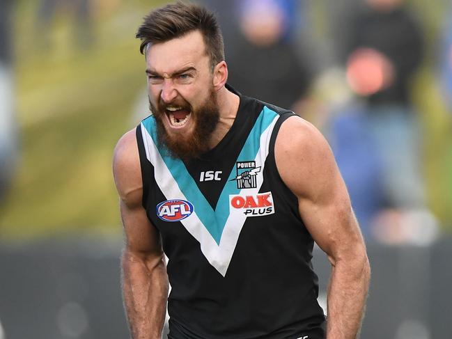 Charlie Dixon of the Power reacts after kicking a goal during the Round 19 AFL match between the Western Bulldogs and the Port Adelaide Power at Mars Stadium in Ballarat, Sunday, July 29, 2018. (AAP Image/Julian Smith) NO ARCHIVING, EDITORIAL USE ONLY