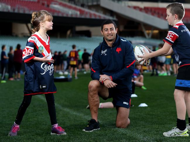 30/05/17 Sydney Roosters player Anthony Minichiello with kids Mikalya Gowers and Jamie Bell at a rugby league coaching clinic at the Adelaide Oval. photo Calum Robertson