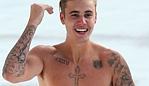 Justin Bieber spotted swimming at Bondi Iceberg in Sydney.