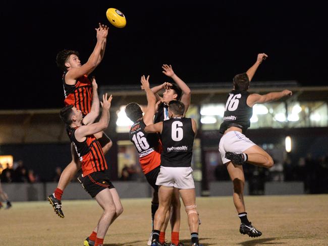 Nick Parks rises above a pack to mark for Panton Hill this year. Picture: Chris Eastman.