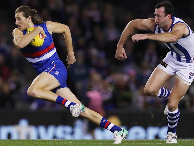 Marcus Bontempelli charges out of the centre. Picture: Michael Klein