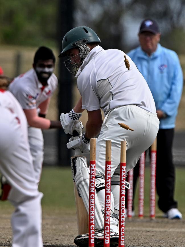 Melton’s Dilshan Kanchana captures the wicket of Box Hill’s Hayden Rayner on Saturday at MacPherson Park. Picture: Andy Brownbill