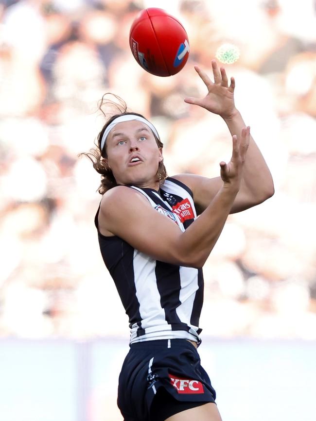 Ginnivan marks during the grand final. Photo by Dylan Burns/AFL Photos via Getty Images