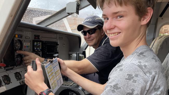 MAF’s Australian head of flight operations Tim Vallance-Webb shows Joshua Baertschi the controls of a MAF plane. Picture: Supplied