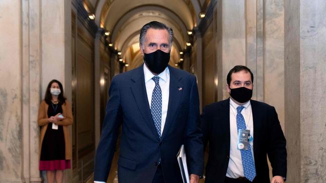 Mitt Romney, one of seven Republican senators to vote to convict Donald Trump, leaves the US Capitol Builidng. Picture: AFP