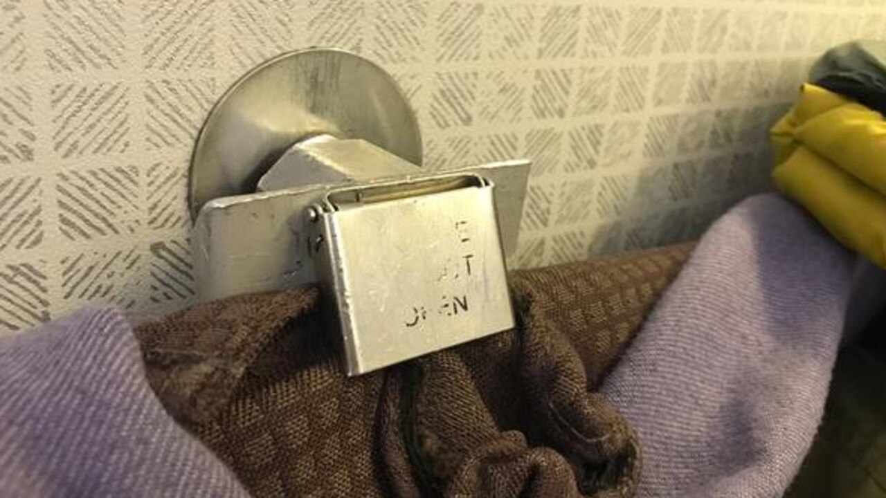 The bassinet clip that failed to hold baby Elim on a Korea Air flight to Seoul earlier this month. A flight attendant had trouble fastening the bassinet to the wall. Picture: Supplied/New Zealand Herald.