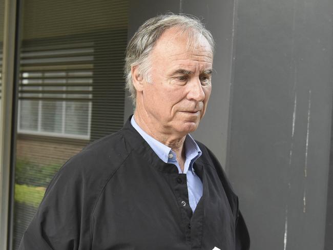 John Alexander Member for Bennelong arriving at his office.