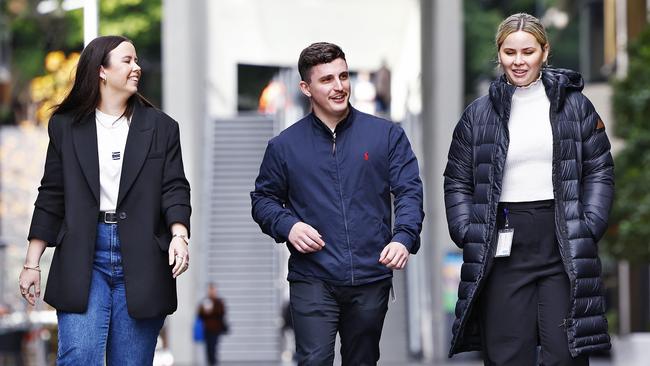 Sydney CBD workers (from left) Rachel James, Marco Masciotra and Laura Gallagher on a lunch break. Picture: Sam Ruttyn