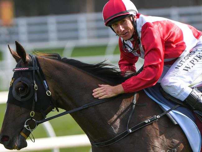 Jockey William Pike returns to scale after his big success at Caulfield in March.