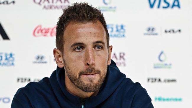 Kane faces the media ahead of the match against Iran. Picture: Paul ELLIS / AFP