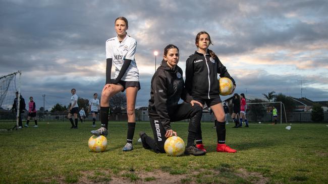 Evie Stosic, Luisa Kump and Mia Lo Presti are concerned with the state of the surface at Hume Reserve. Picture: Brad Fleet