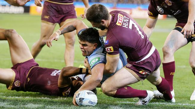 Latrell Mitchell scored moments after Dane Gagai was stripped of the ball early in the second half. Picture: Michael Klein