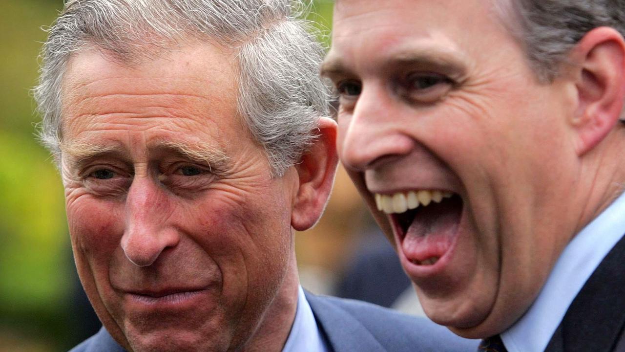 Laughing with brother Prince Charles.