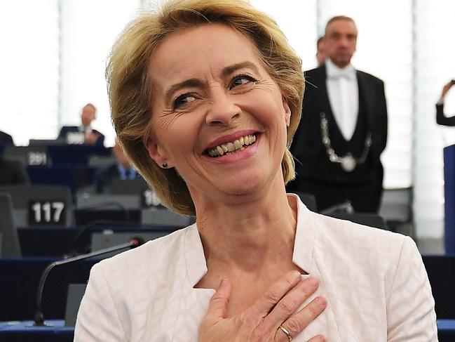 Newly elected European Commission President Ursula von der Leyen reacts after a vote on her election at the European Parliament in Strasbourg, eastern France on July 16, 2019. - German defence minister Ursula von der Leyen was narrowly elected president of the European Commission on July 16, after winning over sceptical lawmakers. The 60-year-old conservative was nominated to become the first woman in Brussels' top job last month by the leaders of the bloc's 28 member states, to the annoyance of many MEPs. (Photo by FREDERICK FLORIN / AFP)