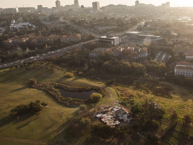 Unequal Scenes: Segregation of urban spaces in South Africa. Picture: Johnny Miller/Millefoto/Rex Shutterstock/Australscope