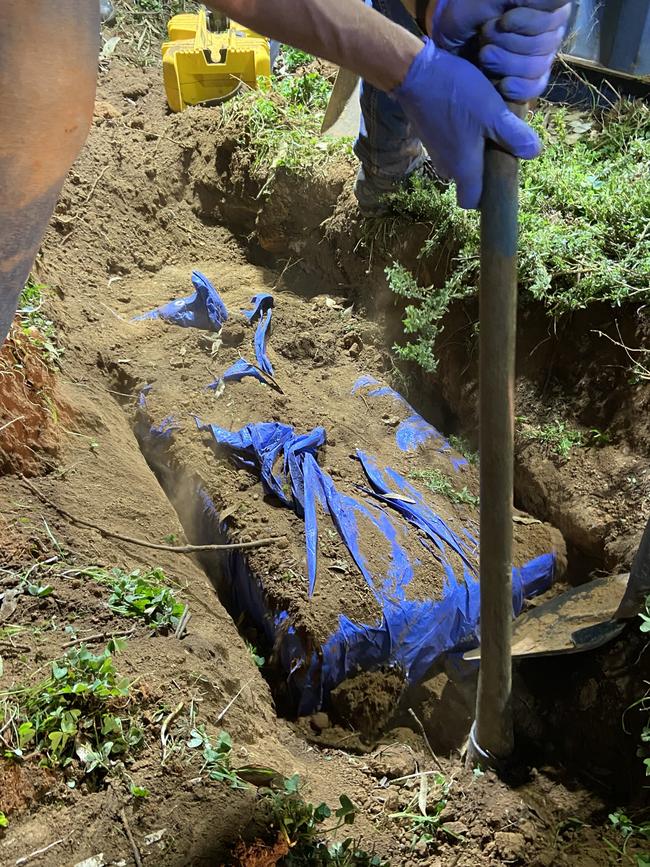 Major Crime detectives digging up guns and ammunition belonging to Clive Raymond Phypers at Booberowie. Picture: South Australian Police/SAPOL