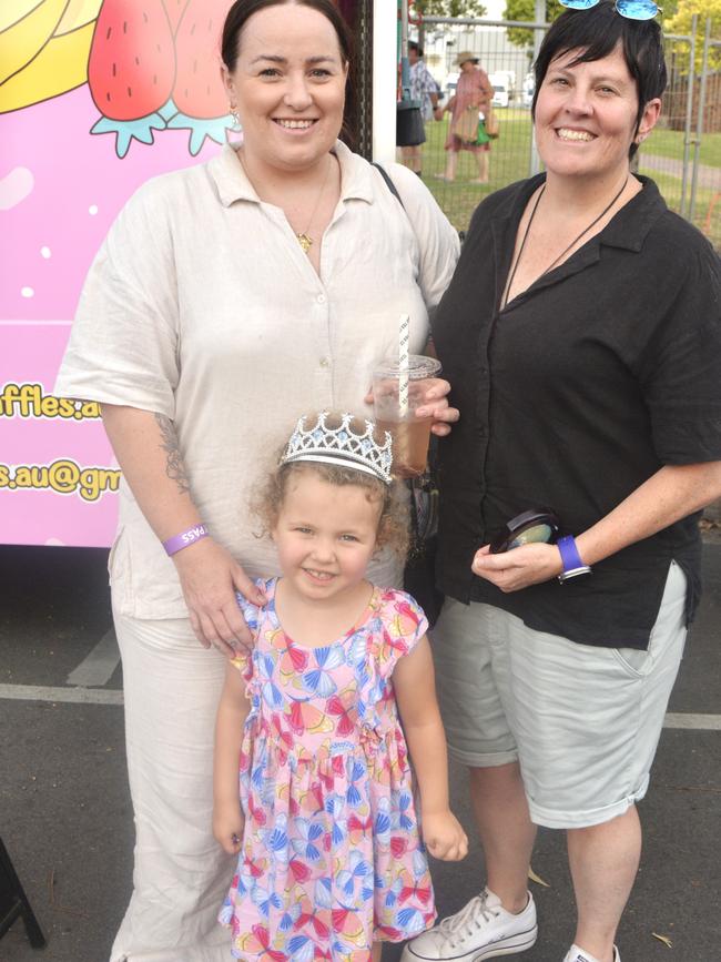 (From left) Josie, Lilly (middle) and Kaila at the Queensland Country Bank Food &amp; Wine Fiesta during Stanthorpe's Apple and Grape Harvest Festival on Saturday, March 2, 2024. Photo: Jessica Klein