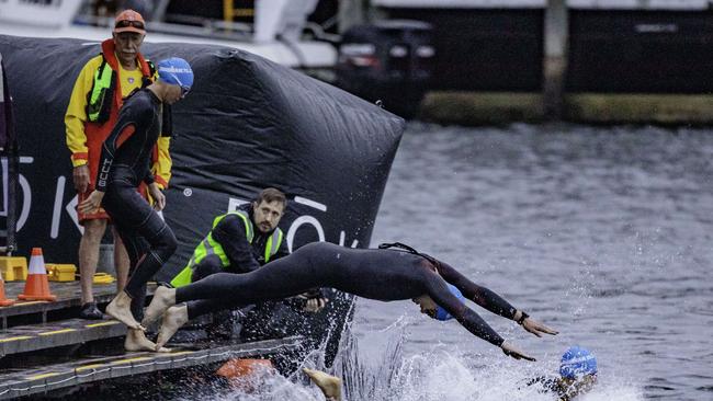 Participants enter the water for the swimming section of the Ironman 70.3 Tasmania in Hobart on Sunday 4th February. Picture: Linda Higginson