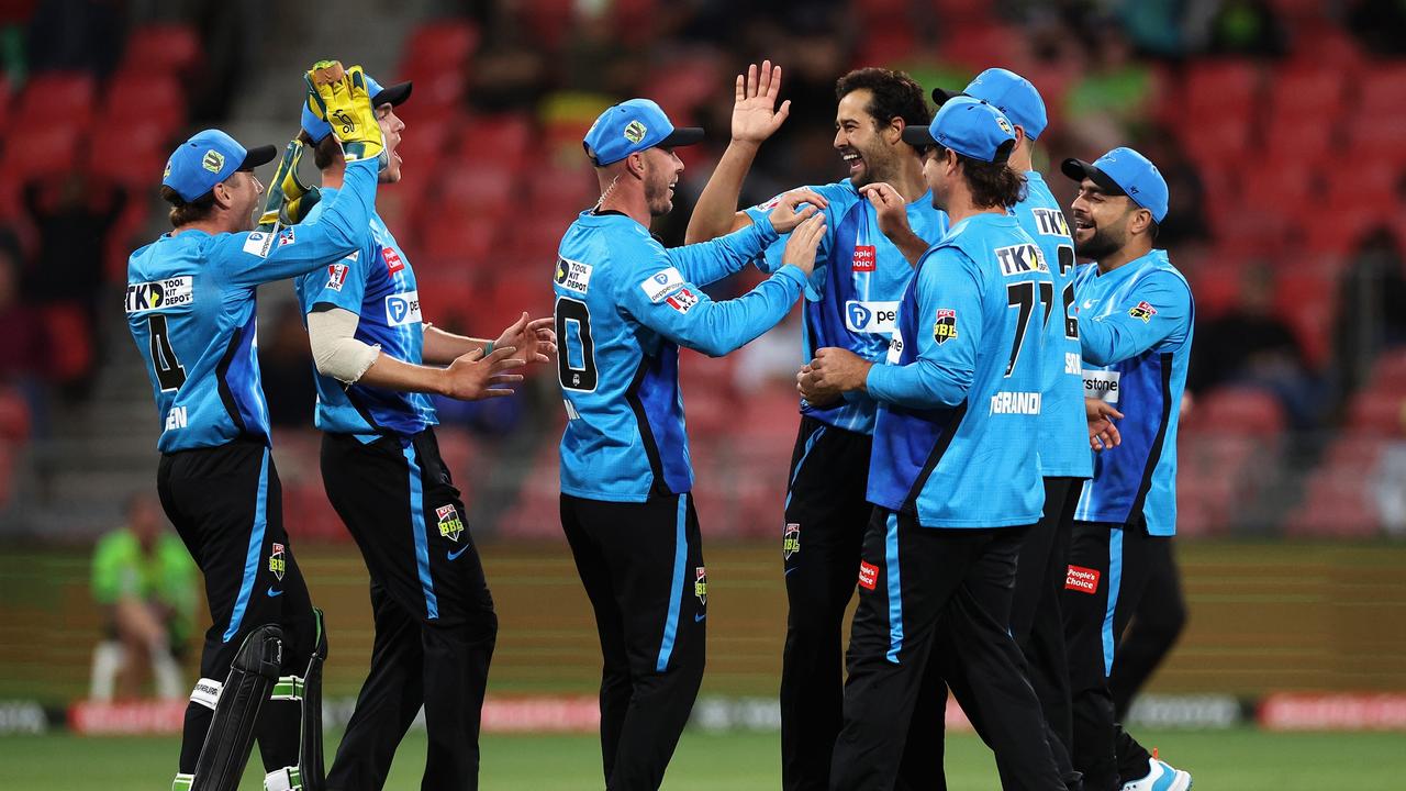 Wes Agar of the Strikers celebrates dismissing Chris Green of the Thunder during the Men's Big Bash League match between the Sydney Thunder and the Adelaide Strikers at Sydney Showground Stadium, on December 16, 2022, in Sydney, Australia. (Photo by Cameron Spencer/Getty Images)