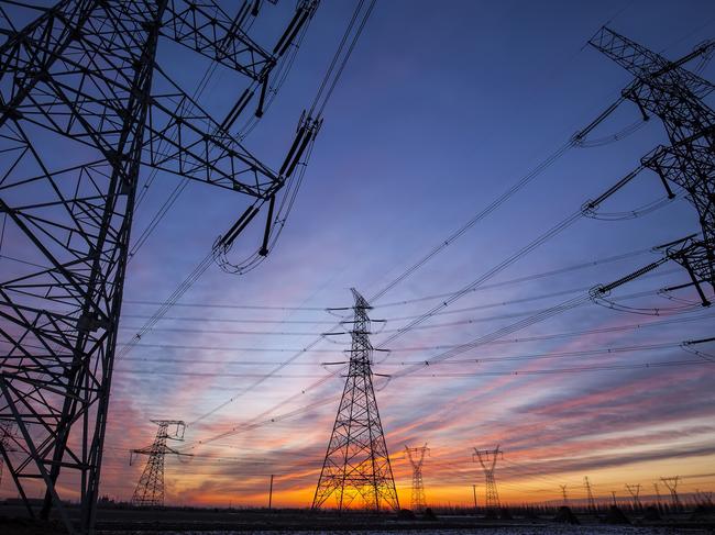 The silhouette of the evening electricity transmission pylon. Istock