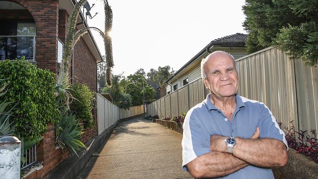 George Sattout lives next to Benaud St lane and wants it shut but the issue continues to divide the neighbourhood. Picture: Carmela Roche