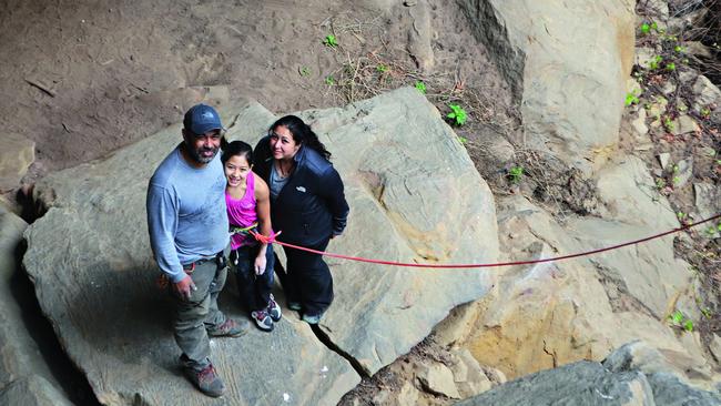 Angie with her dad, Tek, and mum, Claudia. Picture: Claudia Scarth-Johnson