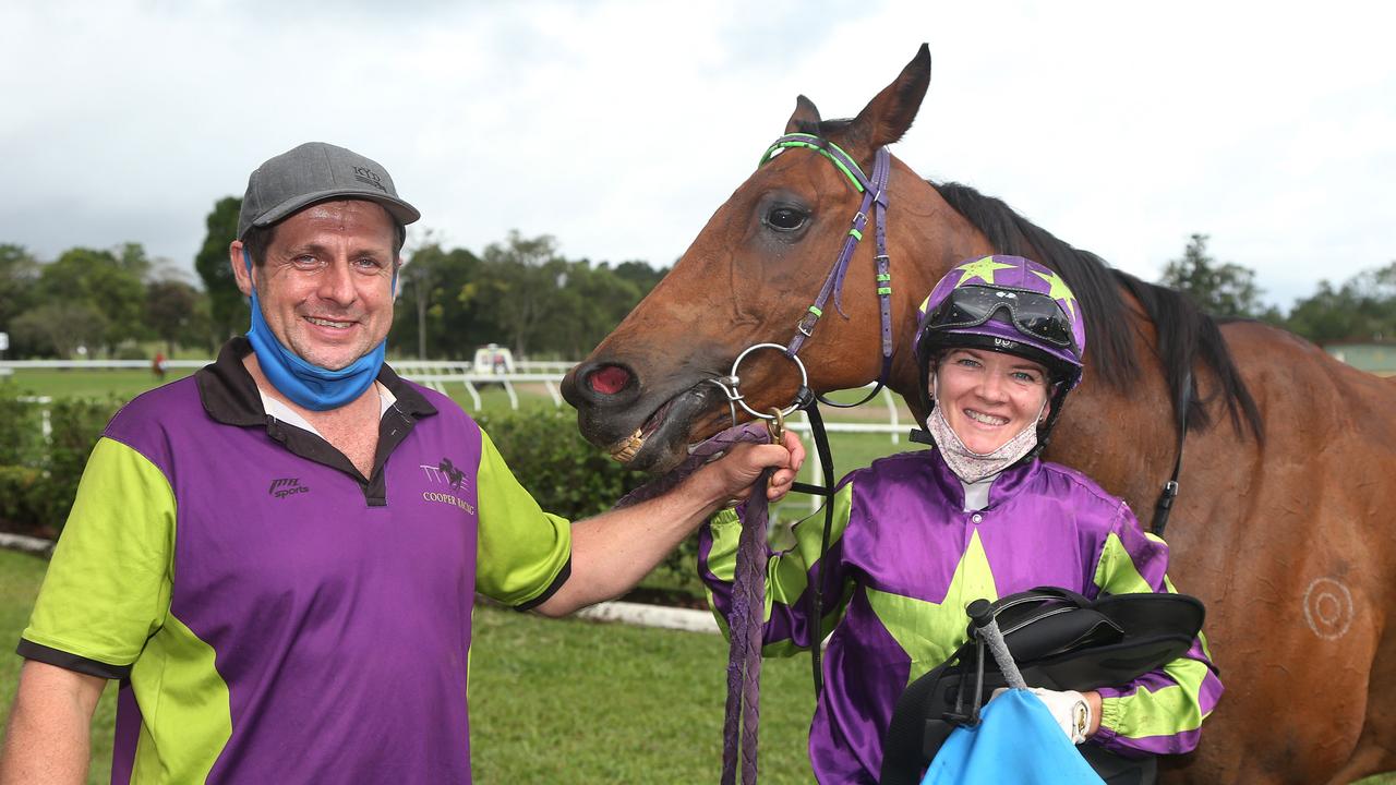 Cairns horse trainer Scott Cooper, jockey Lacey Morrison and Our Chiquilla, winner of Race 4 at the Banana Industry Race Day, held at the Innisfail Turf Club. Picture: Brendan Radke